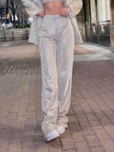 Traje clásico holgado con lentejuelas y pantalones rectos acampanados